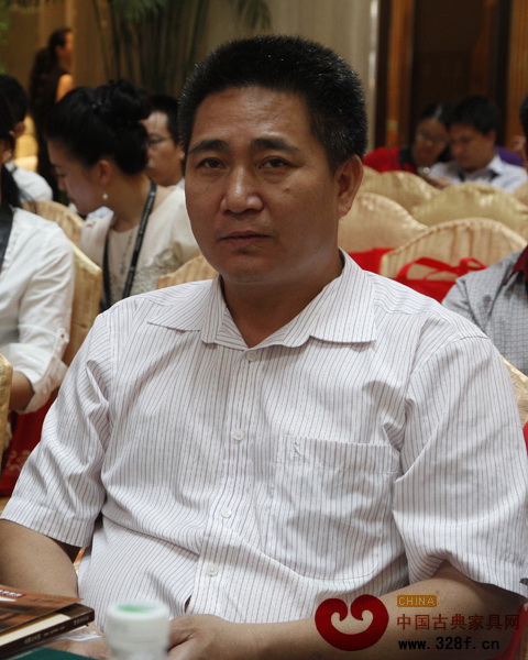 唐明居紅木董事長胡高華