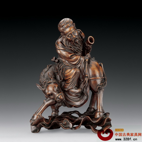 清中期的龍眼木雕作品《張果老騎驢》 清中期的龍眼木雕作品《張果老騎驢》