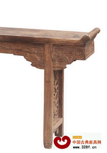 明代黃花梨龍紋翹頭案局部紋理相對(duì)松散,帶有明顯的越南黃花梨特征