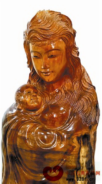 木雕藝人周穩(wěn)——《母子連心》(局部)